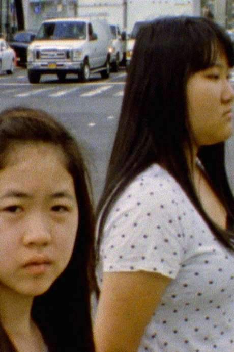 Dear offers a glimpse into the lives of two teenage Chinese girls navigating adolescence in New York City. Through their diary entries, the film explores their experiences growing up as immigrants and the challenges they face within a rapidly changing and gentrifying Chinatown. The film provides a sensitive portrayal of identity, family, and the immigrant experience.
