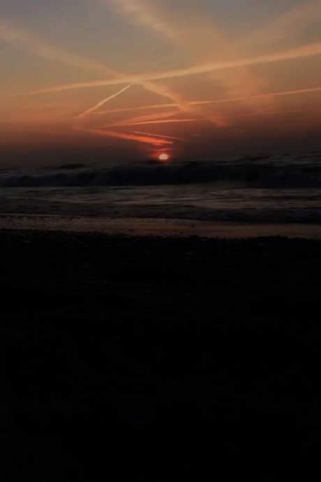 The film presents fleeting images of sun‑drenched horizons and rolling sea, crafted by directors Eli Hayes and Alex Davies. It is released in two distinct cuts: one underscored by an original musical score, and a second version that pairs the visuals with Yellow Ostrich’s track “Fog,” creating a contrasting auditory experience.