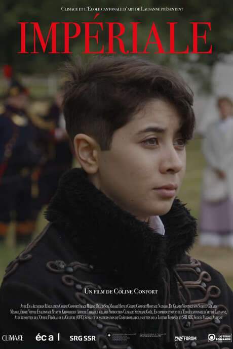 At dawn, a cannon shot signals the start of a new day. A young woman named Eva, aged 21, defies tradition by attempting to join the Imperial Guard, a historical re-enactment regiment inspired by Napoleon’s forces and traditionally reserved for men. Driven by a desire for romanticism, she disguises herself to participate, challenging a longstanding ban. Amidst the sights and sounds of gunpowder and smoke, Eva pursues her dream of becoming a soldier, ultimately finding herself alongside a beautiful princess.