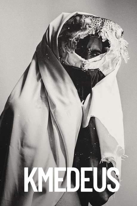 This documentary explores the enigmatic life of Kmêdeus (EatGod), a homeless eccentric who lived on the island of São Vicente, Cabo Verde. Perceived by some as a lunatic and by others as an artist, he remains a compelling mystery. Contemporary dancer António Tavares created a remarkable performance piece inspired by Kmêdeus's life and inner world, taking viewers on a journey through his hometown of Mindelo, showcasing the island’s vibrant music, films, and annual carnival. The film, a collaboration by the Cape Verdean film collective Negrume, delves into the roots of one of the oldest Creole communities.