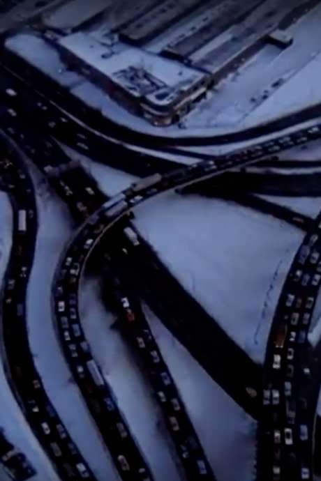 Shot from a local radio station’s traffic helicopter, this short film offers a sweeping portrait of Montreal’s arteries—freeways, interchanges, bridges and downtown streets rendered like a miniature model. The bustling, vibrant tableau is narrated by traffic guide Len Rowcliffe, providing a unique aerial perspective on the city’s constant motion.