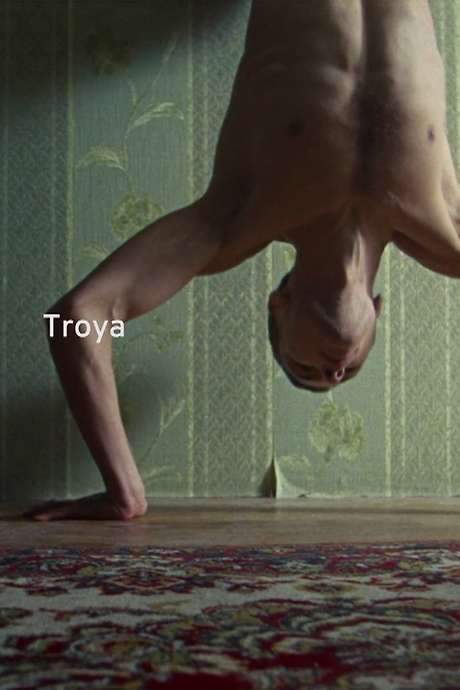 Gordon von Steiner’s “Troya” is a visually striking short film set in the Troieshchyna neighborhood of Kyiv, an area characterized by its stark Soviet-era architecture. The film portrays urban isolation and resilience through a series of gritty vignettes, capturing the raw aesthetics of the neighborhood. It highlights the dense, monotonous apartment blocks and the lives of the residents, contrasting the bleak environment with moments of unexpected beauty and humanity to create a powerful narrative.