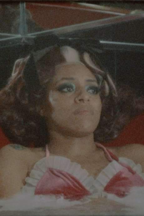 In this 4-minute film, Ayanna Dozier portrays a young woman who seeks to redefine her feelings about love and sexuality by staying at a motel. Inspired by Charles Matton’s "Spermula," the story follows her unsuccessful attempts to embrace superficial happiness, femininity, and passiveness while bathing in a heart-shaped tub. The film is part of the "Close, but no Cigar" trilogy.